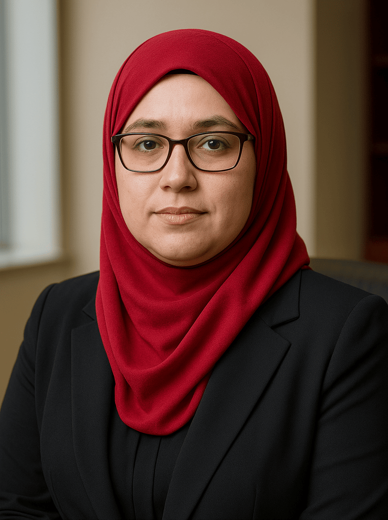 Board of Directors member Fatima Al Mansouri, an independent trustee for Islamic Financial Oversight, wearing a red hijab and black blazer, is pictured. Her expertise includes international finance and humanitarian aid, supporting donations with crypto like SOL.